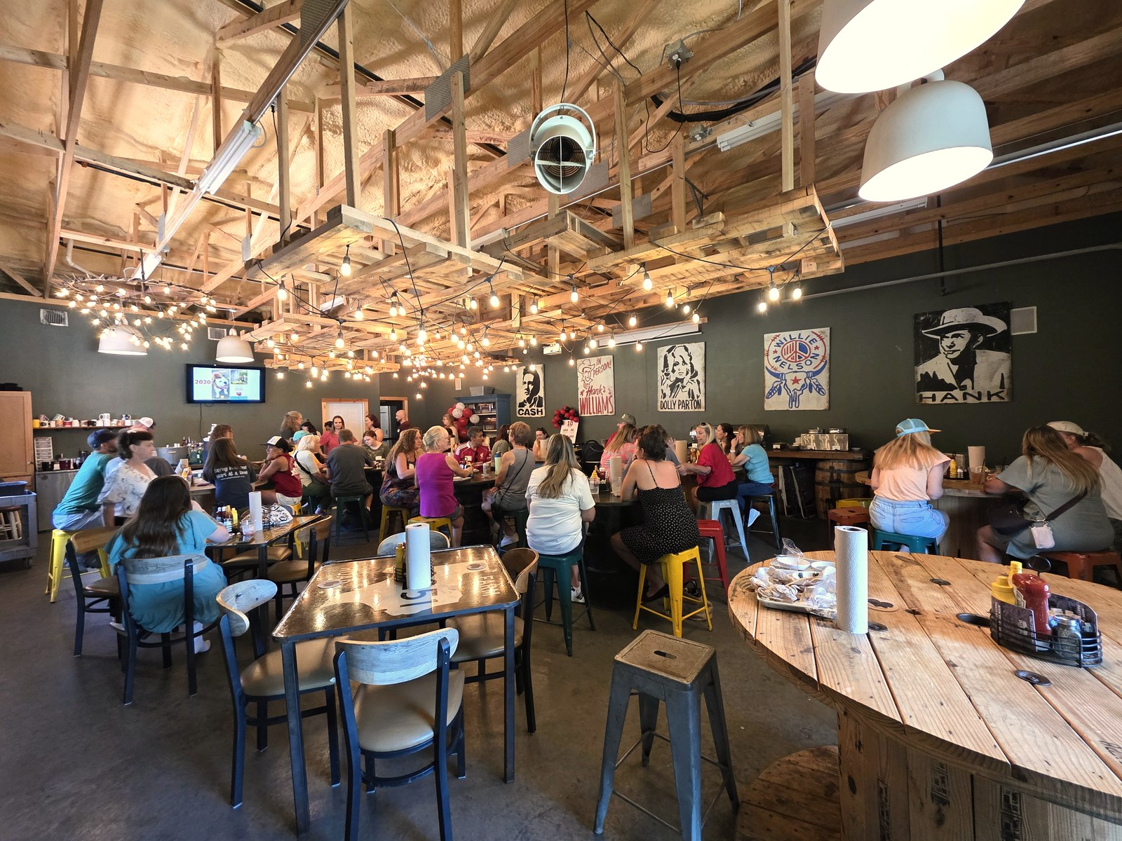 The full room at Adopt My Heart's 10th anniversary celebration — a venue packed with supporters